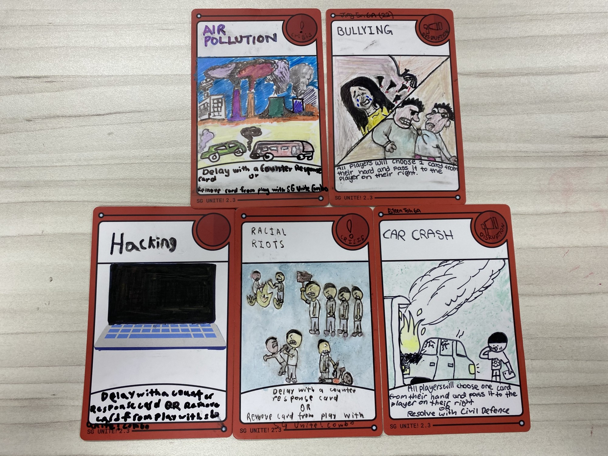 Design entries for SG Unite cards from the Primary 6 pupils.